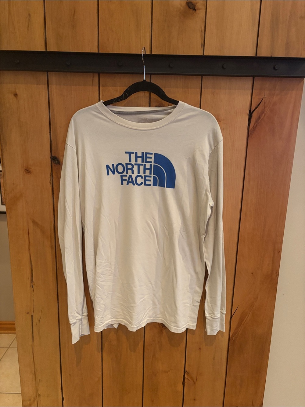 The North Face Long Sleeve Crew Tee in Cream with Blue Logo
